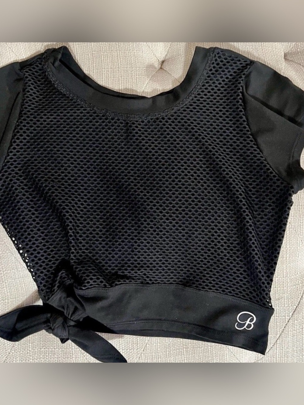 Bombshell Sportswear Mesh Short Sleeve Tie-Hem Top by